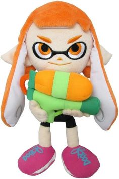 an orange haired stuffed animal with glasses and a green backpack on it's back