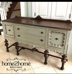 an old dresser has been painted with chalk paint and new knobs on the drawers