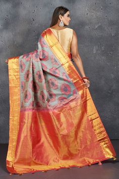 Look elegant at parties and festive occasions in this beautiful grey floral Kanjeevaram saree with pink zari border and pallu. It comes with a matching blouse piece. Shop silk sarees in USA from Pure Elegance. Disclaimer: The shown stitched blouse on the model is for display purpose only. The saree comes with a matching blouse piece and finished with fall and piko. Traditional Gray Festive Lehenga, Traditional Gray Lehenga For Festive Occasions, Gray Traditional Wear For Diwali, Gray Traditional Wear With Pallu, Traditional Gray Wear With Pallu, Gray Dupatta With Zari Work In Traditional Drape, Gray Anarkali Dupatta For Diwali, Anarkali Gray Dupatta For Diwali, Gray Traditional Wear For Wedding And Festivals