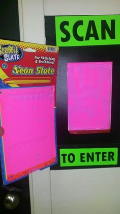 someone is holding up a neon pink paper to enter the scaffold state door