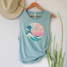 Thank you for visiting my shop! Please feel free to reach to me with anything you need! Best, Aly :) Distressed waves muscle tank. Nature Tank, Muscle Tank, Beach Tanks, Cute Tank Top, Yoga Tank Top, Workout Tank Top, Wave Shirt, Festival Tanks These muscle tanks are super lightweight, durable, and designed for a relaxed fit. With elongated arm holes these tops are perfect for layering over a sports bra or a bathing suit. Sizing: The reviews on sizing are mixed. If you have a larger bust you'll Nature Tank, Summer Tanks, Beach Tanks, Yoga Tank, Yoga Tank Tops, Workout Tank Top, Cute Tank Tops, Summer Tank Tops, Top Summer