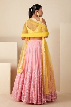 Pink flared lehenga with attached can-can, all over abstract pattern, tonal thread and sequin hand embroidery. Paired with contrast yellow padded blouse with all over abstract pattern, thread hand embroidery and floral embroidered bordered dupatta. - Aza Fashions Festive Fusion Style Fitted Dupatta, Festive Fusion Fitted Dupatta, Fitted Fusion Lehenga With Zari Work, Fusion Style Fitted Lehenga For Diwali, Fitted Fusion Style Choli For Festivals, Fitted Fusion Style Festival Choli, Fusion Style Pink Wedding Dupatta, Festive Fusion Style Fitted Choli, Fusion Style Fitted Wedding Choli