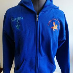 a blue jacket with the name cabin 3 on it