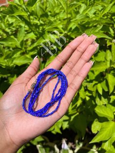 "\"𝒮𝒾𝓁𝓋ℯ𝓇𝓂𝒾𝓈𝓉\" is an iridescent purple and blue waist bead. All waist beads come with a gold barrel clasp at the end. Straight out of Pixie Hollow. FREE LOCAL PICKUP & REDUCED-FEE DELIVERY AVAILABLE! Please message me before placing your order if you would like to use these delivery options. Check out my instagram @beckys.bijoux for styling ideas and more details!" Blue Waist Beads With Spacer Beads As Gift, Blue Colorful Waist Beads As Gift, Blue Beaded Waist Beads As Gift, Blue Spacer Beads For Festivals, Blue Beaded Necklaces With Tiny Beads For Party, Blue Beaded Necklace With Tiny Beads For Party, Blue Beaded Necklace For Party, Blue Party Beaded Necklace With Tiny Beads, Blue Polished Beaded Bracelets For Festivals