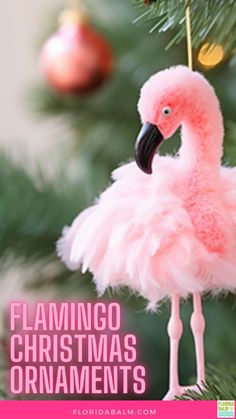 a pink flamingo ornament hanging from a christmas tree with the words flamingo christmas ornaments