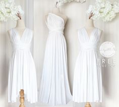 two white bridesmaid dresses on mannequins