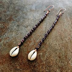 Long Cowrie Shell Earrings Brown Seed Beads, 4" Length With Cowrie Shells, Copper Wire And Ear Wires. Cowrie Jewelry, Cowrie Shell Earrings, African Inspired Jewelry, Cowrie Shell Jewelry, Dread Wraps, Wire Jewelry Earrings, Cowrie Shells, Braids With Extensions, Ocean Jewelry