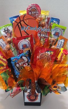 a basket filled with candy and candies on top of a table