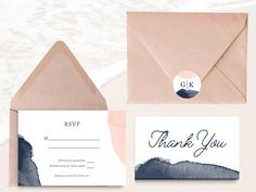 an envelope and thank you card with a watercolor background