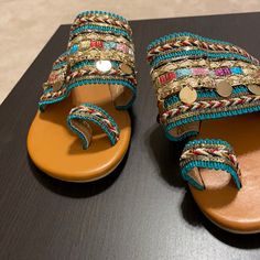 New Slip On Very Colorful Bead And Chain Sandals With Matching Attached Toe Ring. With Tan Leather Bottoms. New. Look Great With Jeans Or Capris Or Just Sitting By The Pool I Would Say Fit Perfect On Size 5 To 6 With Average Width. I Purchased To Wear With A Goth Design Skirt But My Foot Is A 5 Narrow As You Can See Never Worn Just Tried On Bohemian Multicolor Party Sandals, Multicolor Embellished Bohemian Sandals, Bohemian Multicolor Embellished Sandals, Sitting By The Pool, Goth Design, Chain Sandals, Design Skirt, Toe Ring, Toe Rings