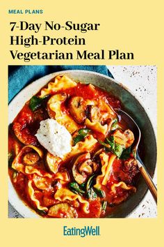 a plate with pasta and vegetables on it next to a blue napkin that says 7 - day no - sugar high protein vegetarian meal plan