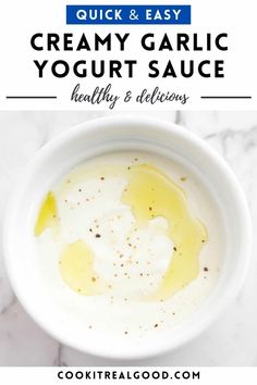 creamy garlic yogurt sauce in a white bowl with text overlay that reads, quick and easy creamy garlic yogurt sauce healthy & delicious