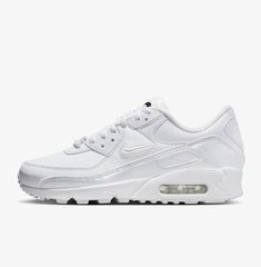 Elevate your sneaker game with the Nike Air Max 90 SE 'Dance Iridescent' in white. This women's shoe features a low-top silhouette with a lace-up closure and adjustable fit for comfort. The shoe's upper is made of leather with a blended fabric, and the outsole is made of durable rubber with cleats for better traction. This Nike Air Max 90 SE boasts a solid white color with metallic accents and the iconic Nike logo. Perfect for activewear, casual outfits, and workwear, this shoe is cushioned for all-day comfort. Available in women's US shoe size 10 and UK shoe size 7.5, this brand new Nike Air Max 90 SE is a must-have for any sneaker lover. Nike Air Max 90 Se, Nike Air Max 90 Women, Old Clothes Refashion, Sneaker Lovers, New Nike Air, Sneaker Games, Nike Air Max 90, Shoes Nike, Nike Air Jordan