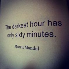 an old book with a quote written on the front and back cover that reads, the darkest hour has only sixty minutes