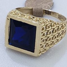 All 100% solid real 14k GOLD Big, strong, , Elegant and Brilliant Real Solid 14k yellow gold men's ring with approximately 5 carat beautiful   high quality  flawless blue navy cubic zirconia . Made in Italy Excellent quality and design It is stamped 14k inside the ring for authenticity Approximate measurements Weight: 6.4m8 grams Front of the ring dimension 0.55x0.55 inch Ring Size is 9 and it is sizable for FREE up/down to two sizes Let me know your correct and exact ring size same time as check out see pics for details and size. Please acknowledge the sizes. Hand made As Stated the stones is high quality cubic zirconia, it is hand cut and polished exactly like natural stones .it is nothing like an ordinary CZ and it are harder and will not get cloudy and look better than most natural sto Navy Ring, Navy Rings, Classy Ring, Yellow Gold Mens Rings, 9 September, Square Ring, Square Rings, Free Boxes, Men's Jewelry Rings