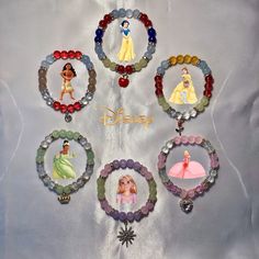 the disney princess bracelets have been made out of glass beads