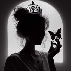 a woman with a butterfly in her hand and a tiara on her head is looking out the window