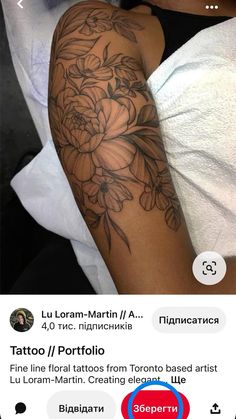 a woman with a flower tattoo on her arm