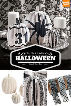 halloween decorations and candles are displayed on a table with black and white damask wallpaper