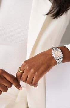 A total of 126 diamonds illuminates this elegant watch featuring a mother-of-pearl dial and high-shine square case housing accurate Swiss-quartz movement. The polished seven-link bracelet is interchangeable with any 16mm MICHELE strap—sold separately—to match any occasion or mood. 31mm case, 16mm band width Deployant clasp closure Swiss quartz movement Total diamond weight: 0.57ct. Color: G–H Clarity: SI1 Signature MICHELE crown Mother-of-pearl dial Sapphire crystal face Stainless steel/diamond Mw Logo, Michele Deco Watch, Diamond Watches Women, Multi Gemstone Bracelet, Silver Platforms, Deco Architecture, Bracelet Watches Women, Double Diamond, Art Deco Architecture