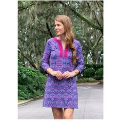 This Tunic Dress Is Enhanced With A Contrast Neckline And Our New Carolina Print With Purple And Pink Hues. Perfect For Fall, This Dress Is Made With Luxurious Fabric That Features A Heavier Weight To Keep You Protected During Cooler Temps. Wear It For Your Next Video Call Or Date Night, This Dress Is Made To Do It All. All Cabana Life Styles Are Complete With 50+ Uv Protection And Made For Everyday Style. 50+ Upf Protection Blocks 98% Of Uva + Uvb Rays Nylon/Spandex Breathable Wrinkle-Resist Terry Cloth Dress, Short Sleeve Floral Dress, Classic Shirt Dress, Sleeveless Shift Dress, Sport Dress, 80 Dress, 70 Dress, Swimsuit Cover Ups, Purple Fashion