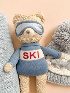 Meet Benjamin Ski Bear, the ultimate powder hound who hits the slopes early for fresh snow and enjoys a cozy cocoa break at 10 o'clock—the perfect winter gift. Suitable for all ages. Bar Apron, Candle Wrap, Birthday Congratulations, Clock Gift, Ski Sweater, Print Calendar, Back Bag, Eye Pillows, Holiday Baby