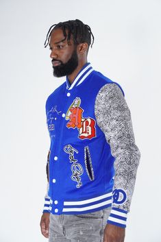 FROST ORIGINALS HONEST BREAD WOOL VARSITY JACKET Also available in #BIGANDTALL sizes COLORS: Black, Red & Royal BODY: 50% WOOL 50% POLYESTER SLEEVE: 100% LEATHER LINING: 100% POLYESTER Twill Fabric, Embroidery, Chenille applique Chainstitch Multi-colored rib Embroidered text on front body Frost Originals Label Snap Buttons true to size Fitted Varsity Jacket With Pockets For Winter, Fitted Varsity Jacket With Button Closure For College, Winter Varsity Jacket For Streetwear, Urban Winter Fitted Varsity Jacket, Urban Fitted Varsity Jacket For Winter, Fitted Varsity Jacket For Streetwear, Fitted Urban Varsity Jacket With Pockets, Urban Fitted Varsity Jacket With Pockets, Fitted Varsity Jacket With Pockets For Streetwear