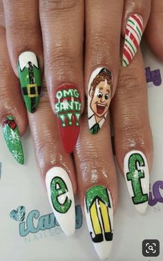 Christmas Film Nails, Elf Nail Designs, Grinch Stilleto Nails, Buddy The Elf Nails Designs, Elf Movie Nails, Funky Christmas Nails Acrylic, Christmas Movie Nail Art, Elf Nails Christmas, Elf On The Shelf Nails