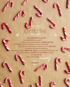 candy canes are scattered around the message for joy to the world