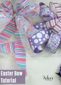 an easter bow is shown with purple flowers and polka dot ribbon on the front of it