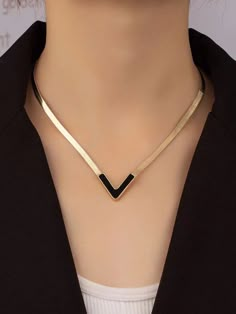 All In Black Necklace is an ideal choice for the fashionista who wants to make a bold statement. Its classic black design makes it both timeless and stylish, sure to complement any outfit. It's perfect for adding just the right amount of flair to your ensemble. Length 16.1"-18.9" Due to monitor differences, actual colors and/or patterns may vary slightly from online. Luxury Modern Dangle Necklaces, Luxury Minimalist Snake Chain Necklace For Formal Occasions, Luxury Black Lariat Necklace Gift, Luxury Formal Clavicle Chain Necklace, Luxury Black Long Necklace, Luxury Elegant Office Jewelry, Elegant Black Luxury Lariat Necklace, Modern Luxury Office Jewelry, Vee Line Necklace