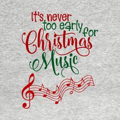 the words it's never too early for christmas music on a grey t - shirt