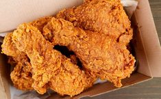 some fried food in a box on a table