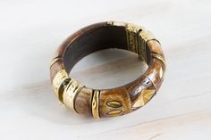 Vintage Brown Brass Carved Horn Bangle, Vintage Bracelet, Rustic Bracelet , Hippie Bangle, boho trib Bohemian Brown Brass Bracelet, Bohemian Brown Brass Bracelets, Unique Brass Bangle For Festival, Adjustable Bohemian Brass Bangle, Bohemian Handmade Brown Bangle, Handmade Brown Bohemian Bangle, Handmade Bohemian Brown Bangle, Adjustable Brown Bohemian Bangle, Bohemian Bronze Brass Bangle