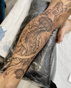 a person with a tattoo on their arm