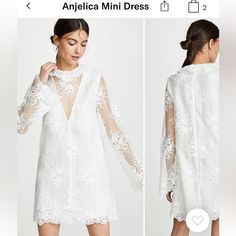 the dress is white and has long sleeves with sheer laces on it, along with an open back