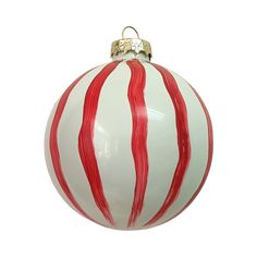 a white and red striped ornament hanging from a ceiling fixture with gold trim