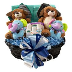 a basket filled with stuffed animals and baby items