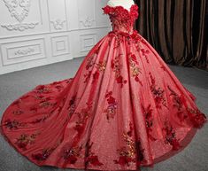 This ball gown-style dress is made from luxurious tulle fabric that creates a voluminous and elegant skirt, giving you that perfect princess look. The vibrant red color exudes confidence and passion, ensuring you stand out as the star of the celebration. The off-the-shoulder neckline adds a touch of sophistication and romance, highlighting the shoulders and collarbones while keeping the look timelessly chic. The sleeveless design gives a flattering, streamlined silhouette, while the intricate ap Red Quinceanera Dresses With Gold, Dark Red Quinceanera Dresses, Ribbon Petals, Gown Style Dress, Quinceanera Dresses Red, Sweetheart Evening Dress, Quinceanera Ideas, Quince Dress, Gown Style