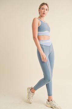 Stay cool and comfortable during your workout with our Color Contrast Tank Top & Leggings Set. The high neck tank features a racerback design for added support, while the high rise leggings offer four way stretch and moisture wicking technology for ease of movement. Lightweight and breathable, this set will support you through any exercise routine. InseamS - 26"M - 26.25"L - 26.5"Model InfoHeight: 5'10" Bust: 32"Waist: 25"Hips: 35.5" Model is wearing size S. Cheap Mid-rise Spring Activewear, Affordable High-waisted Spring Activewear, Affordable Mid-rise Sports Activewear, Light Support Athleisure Activewear, Affordable Sporty Leisure Activewear, Workout Leggings Outfit Casual, Thigh High Boots With Skirt, Leggings Outfit Casual, Beachy Outfits