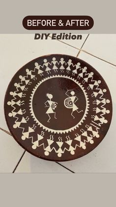 a brown and white plate sitting on top of a tiled floor