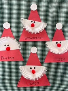 four paper plates with santa hats on them and the words stachen written in red