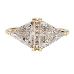 a three stone diamond ring in yellow gold with diamonds on each side and sidestones