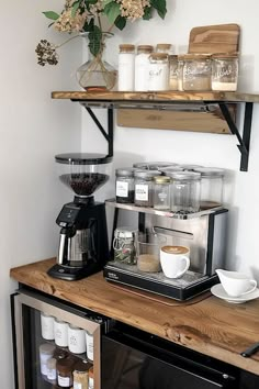 the coffee maker is on top of the counter