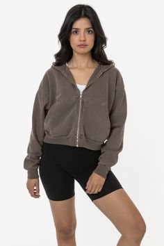 Made from a luxurious 14oz fleece, our cropped zip-up hoodie is meticulously designed to flatter your curves and accentuate your waist. The cropped silhouette hits just above the belly button, highlighting your toned mid-section and creating a balanced look. The sleeves are slightly dropped for a relaxed look.This hoodie is Garment Dyed.Our garment-dyed hoodies are dyed after they're sewn, which gives them a more durable and even color, including in the stitching and ribbing. This also means they'll have less shrinkage and colors will stay true after repeated washings.Features: Made from our premium 14oz heavyweight fleece to keep you warm Cropped look that sits just above the belly button to flatter your curves Lowered sleeves for a relaxed and casual look Full-zip closure: Easy on, easy Cropped Zip Up Hoodie, Los Angeles Apparel, Garment Manufacturing, Cropped Crewneck, Cropped Zip Up, Fleece Sweatpants, Baby Tee, Pose Reference, Infant Tees