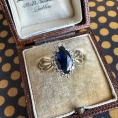 Details: Vintage Sapphire and diamond 14K yellow gold ring--would make a lovely wedding ring or a perfect addition to any collection! The sapphire measures 10mm x 5mm and is a navette cut (rough estimate between .65-.75 carats); and 16--1 mm diamonds. The ring is stamped 14K. This is a beautiful ring--you will not be disappointed! Please ask all necessary questions prior to placing an order. Measurements: The size is 6 3/4 US and can be sized for a fee. The weight of the ring is 3.5 grams. Condition: The overall all condition of this ring is very good vintage condition. Vintage Sapphire, Etsy Gold Ring, 14k Gold Ring, Beautiful Ring, Sapphire Diamond, Bridal Sets, Yellow Gold Rings, Beautiful Rings, Wedding Rings Engagement