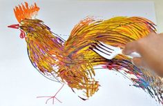 a drawing of a colorful chicken with a fork in it's hand, on top of a piece of paper