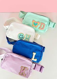 Our cute nylon fanny packs are perfect for every girl any age  We have so many fun colors and patches to choose; the bags are customizable and fit around 3 letters depending on letter shape, if you're not sure I am happy to help and measure for you. Our patches are sewn on! Bag size: 5.5"x8.5"  Patches are permanently glued to the backpack. After dried and cured, they are SEWN ON! to ensure they will stay forever :) IMPORTANT: each patch counts as one, Letters are also considered patches Pink School Bag With Letter Patch, Pink School Bags With Letter Patch, Trendy Everyday Bag With Letter Patch, Trendy Customizable Bags, Trendy Customizable Back-to-school Bags, Casual School Bag With Embroidered Logo, Trendy Blue Belt Bag For School, Chenille Patches, Chenille Patch