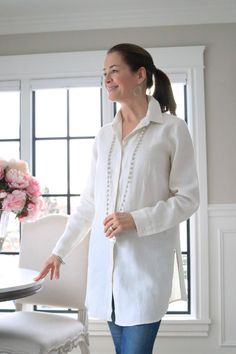 Another one of our best sellers! The Christina linen button up tunic with slits on the side and a bit longer in length so it can be worn over leggings, skinny jeans, or as a light jacket. Very comfortable for a casual look or dress it up. 100% European linen Machine wash, hang to dry. Iron if desired. Made in Ukraine. Spring Linen Tunic With Buttons, Chic Cotton V-neck Tunic, Spring Cotton Button-up Tunic, Linen Tops With 3/4 Sleeves And Buttons, Long Linen Shirt, Relaxed Fit Linen V-neck Tunic, European Linens, Serving Piece, Light Jacket