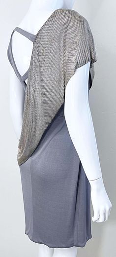 For Sale on 1stDibs - Amazing early 2000s CD GREENE gray silk jersey and silver mesh Chainmail dress ! Greene actually studied architecture, but his recalling was fashion. His Fitted Chainmail Dress For Evening, Fitted Chainmail Dresses For Evening, Jersey Dresses 2000s, Embellished Silver Silk Dress, 2000s Sheer Top, Silver Chainmail Dress, Chainmail Runway, Chainmail Dress, Gray Silk